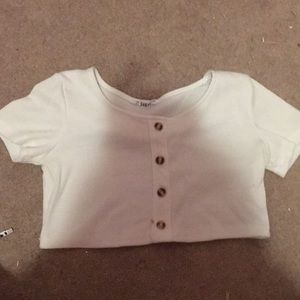A white button crop top from shein